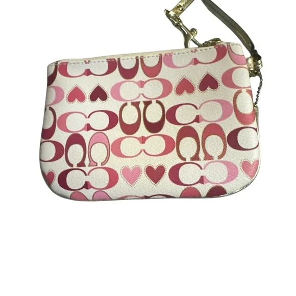 Coach Poppy Pink/Heart Printed WristletEUC (dust bag included)